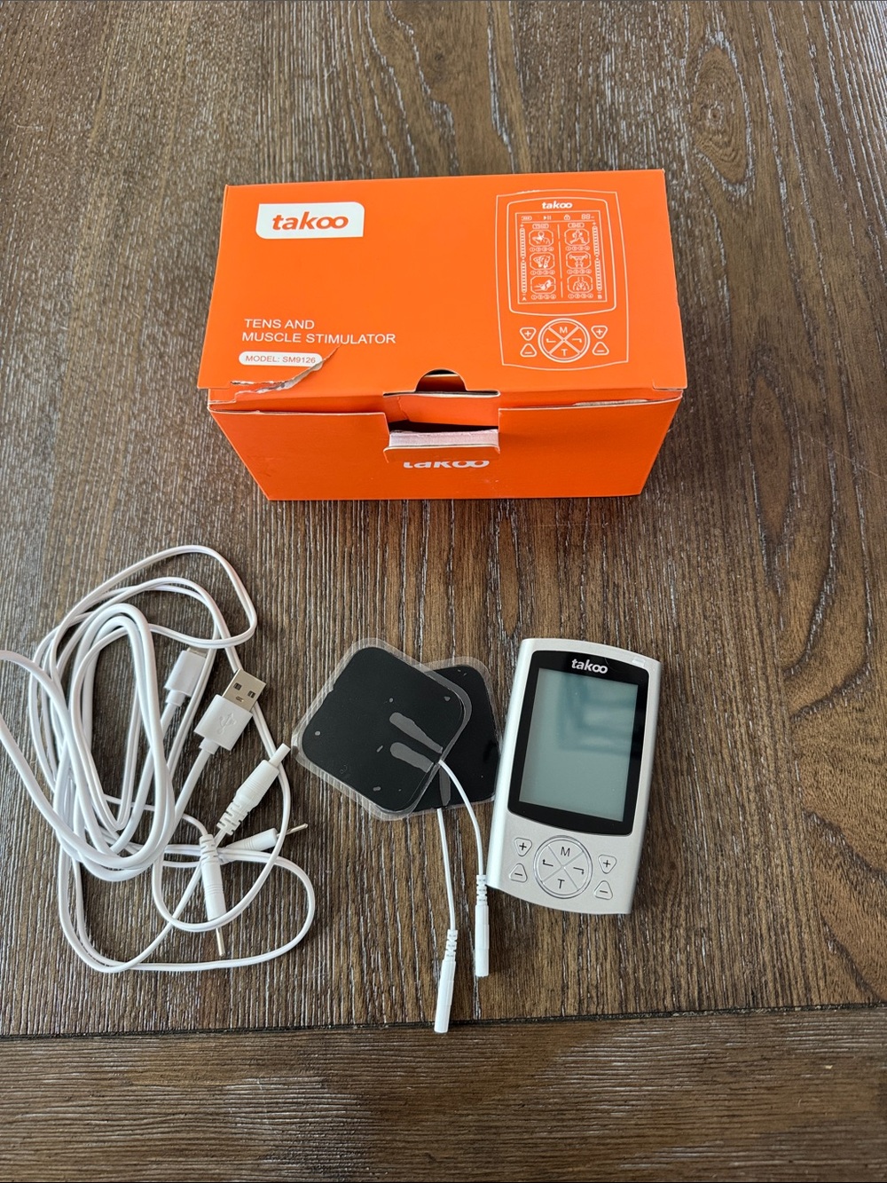 Takoo TENS & Muscle Stimulator - White with Black Electrodes